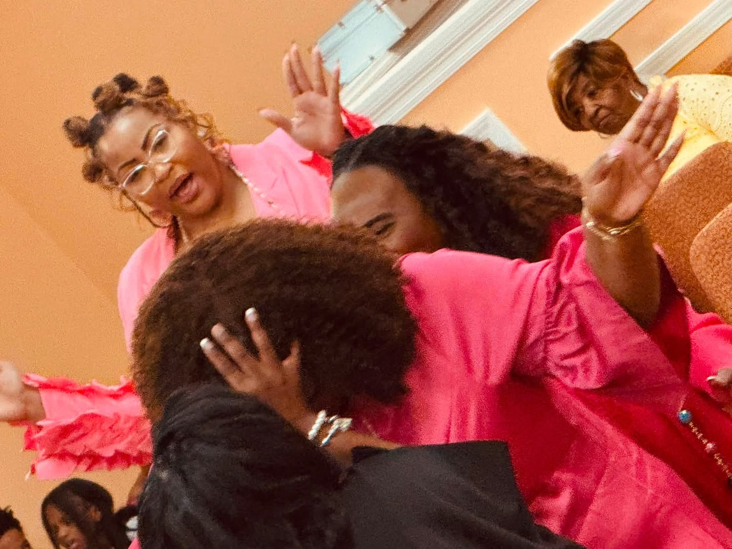Worshippers reaching out in prayer